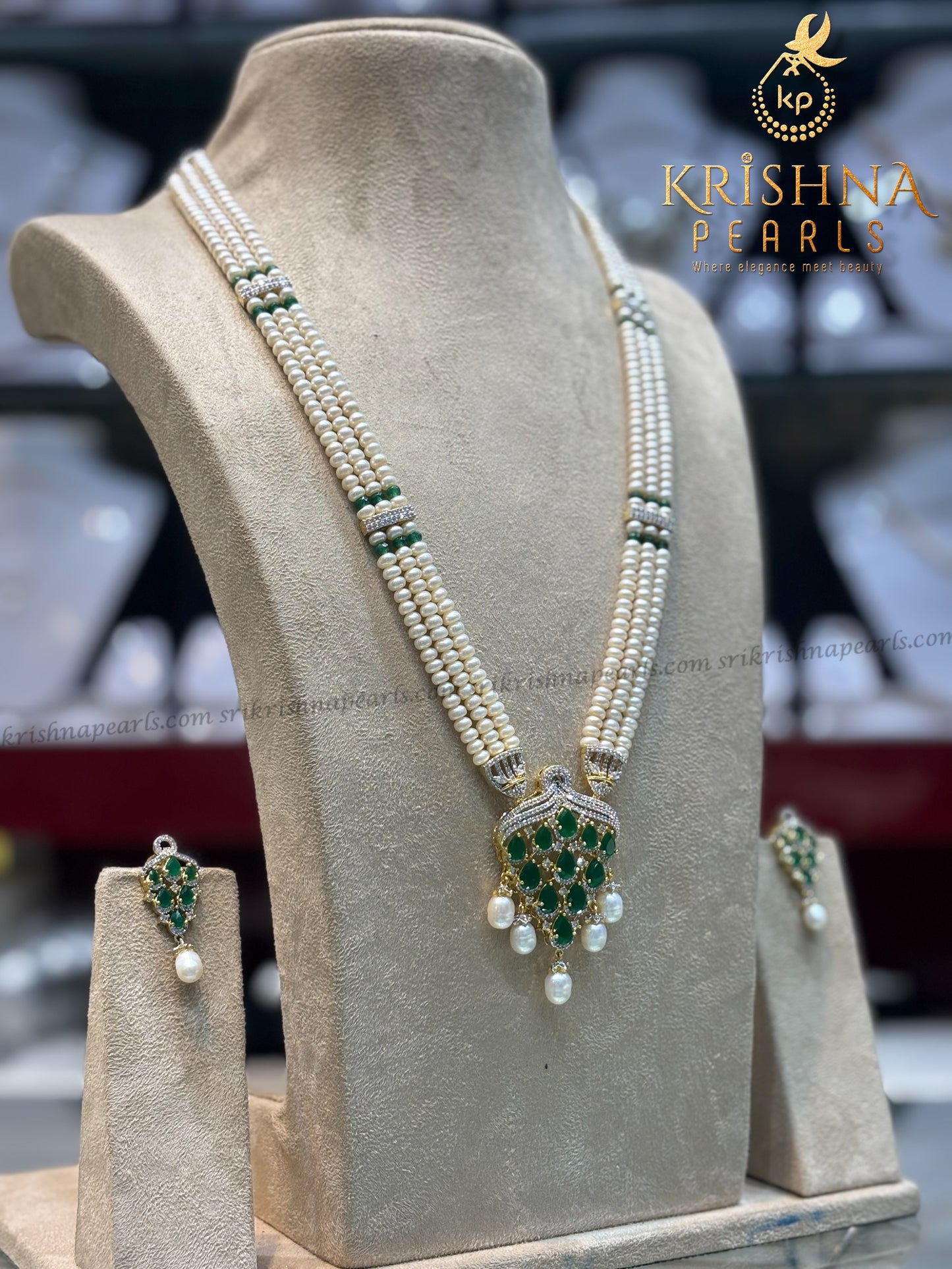 Exclusive Emerald Studded Pearls Necklace Set