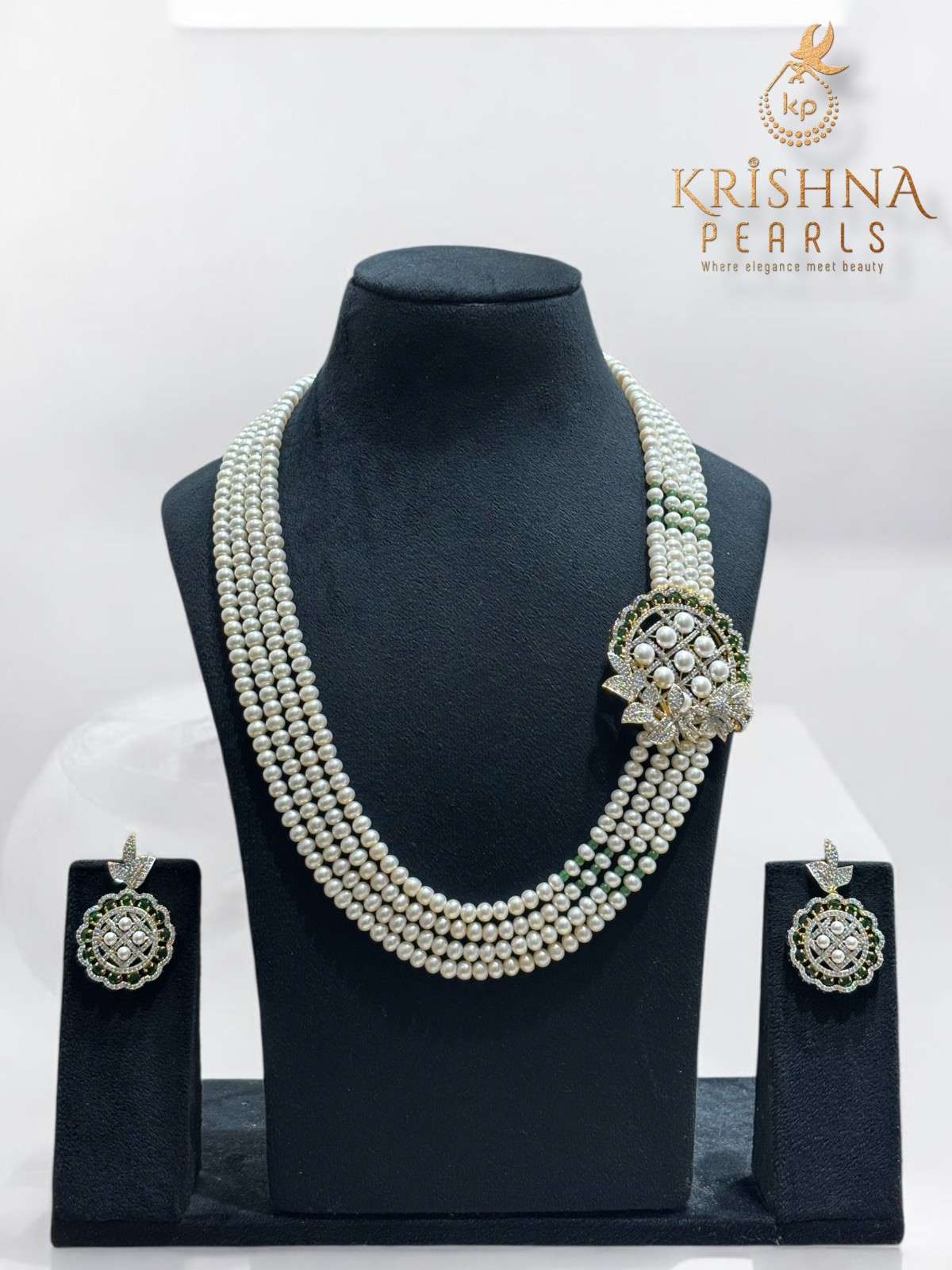 Exclusive Emerald & Pearls Studded Four Layers Pearls Side Broch Set