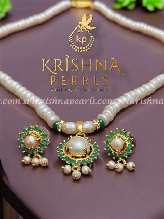 Traditional Pearls Set with Emerald Locket