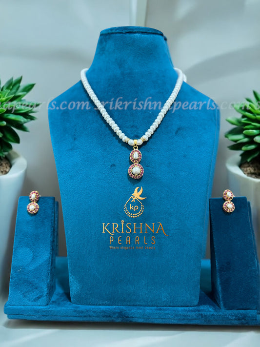 Exquisite Single Line Natural Pearl Set with Double Decker Ruby Design