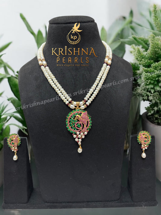 Natural Pearls Set with Ruby Emerald Studded Locket