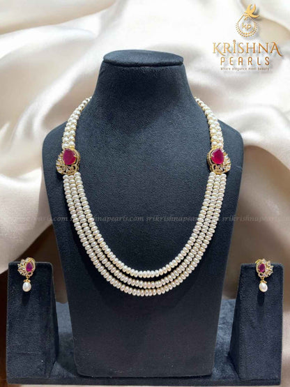 Adorable Ruby Studded Side Broch Pearls Necklace Set