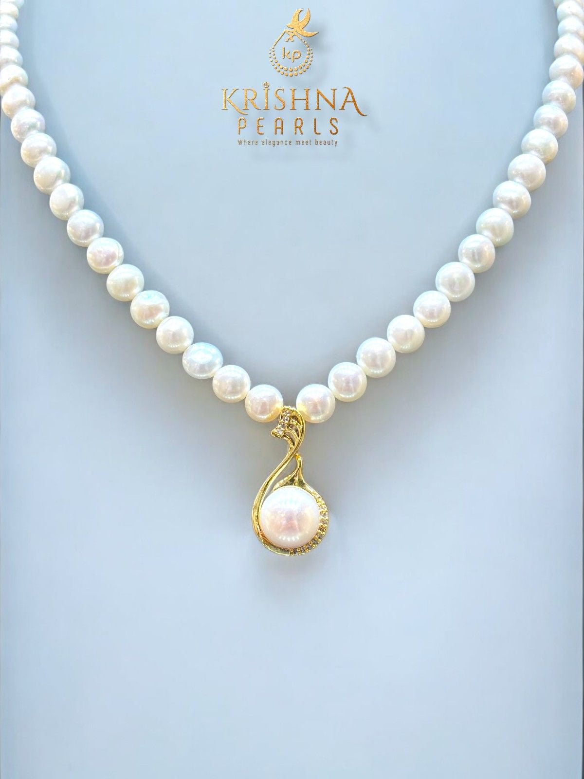 Adorable Big Pearl Studded Pendent With Button Pearls Necklace Set