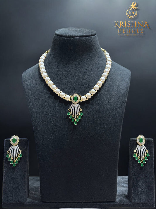 Luxurious Emerald Studded Pendent With Button Pearls Necklace Set