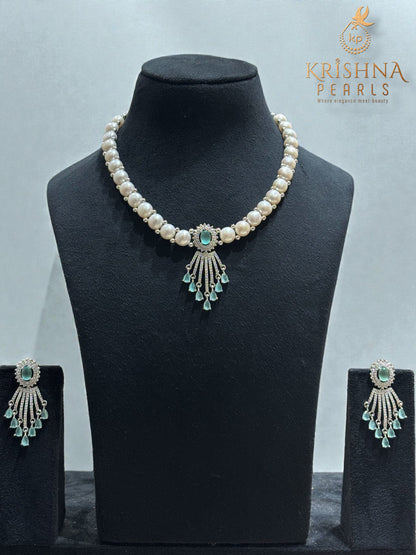 Luxurious BlueQuartz Studded Pendent With Button Pearls Necklace Set