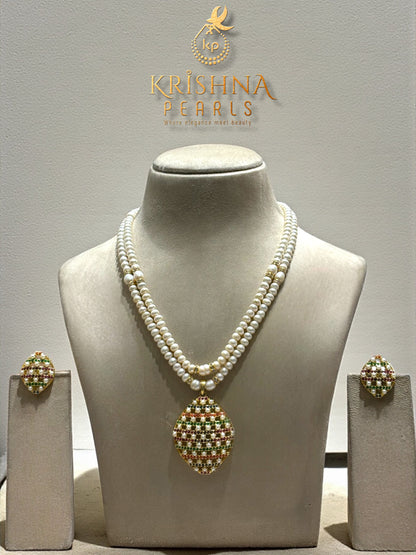 Navratna-Inspired Hyderabadi Pearl Necklace Set with Blue Sapphire, Coral, Ruby & Emerald