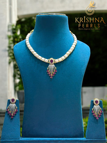 Luxurious Ruby Studded Pendent With Button Pearls Necklace Set