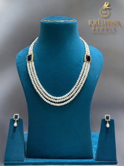 Designer Blue Sapphire Studded Two Side Broch Pearls Set
