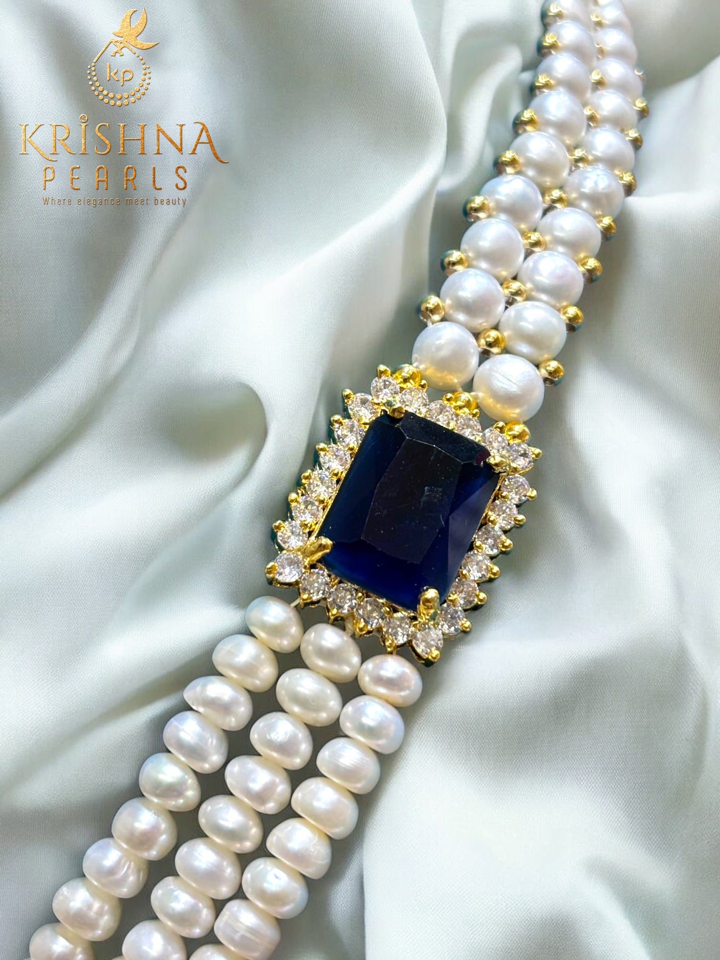 Designer Blue Sapphire Studded Two Side Broch Pearls Set
