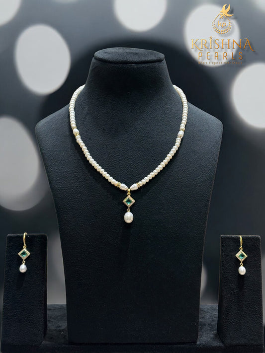 Elegant Emerald Studded Pearls Combo Set ( Single Line Pendent Set With Finger Ring )
