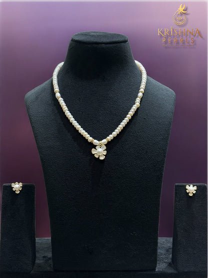 Beautiful Floral White Pearl Studded Pearls Combo Set ( Single Line Pendent Set With Finger Ring )