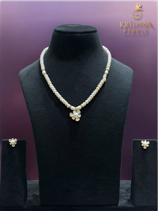 Beautiful Floral White Pearl Studded Pearls Combo Set ( Single Line Pendent Set With Finger Ring )
