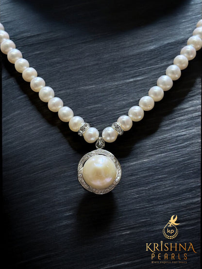 Shimmering Halo Pearl Pendant & Studs Set in 92.5 Silver