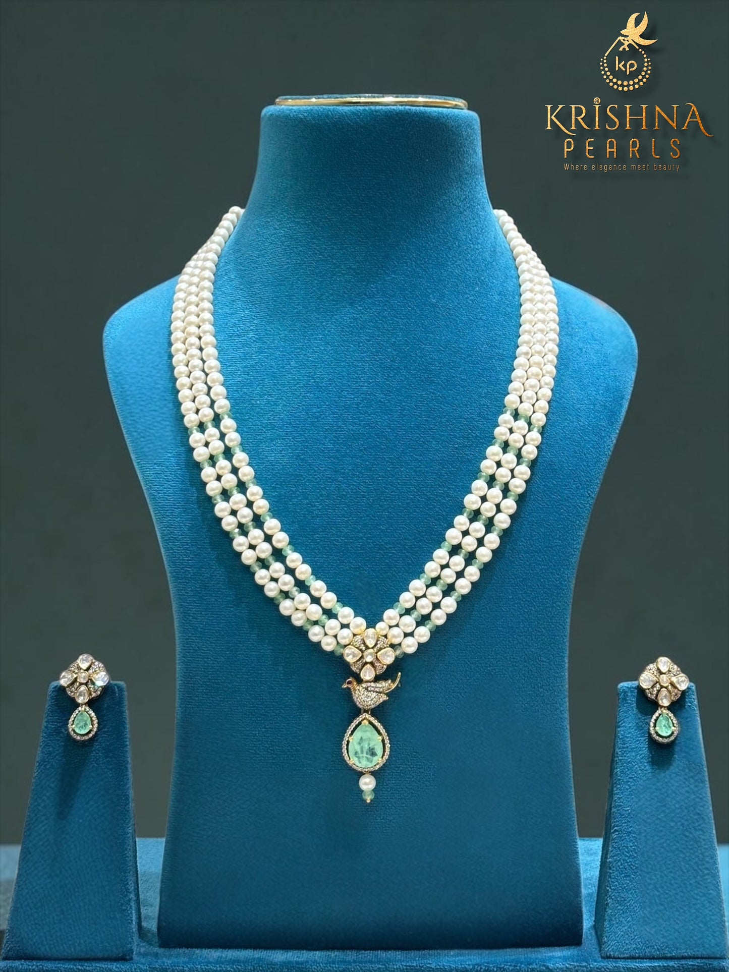 Embellishing 92.5 Silver Green Stone Zari Polki with Round Natural Pearl Necklace Set
