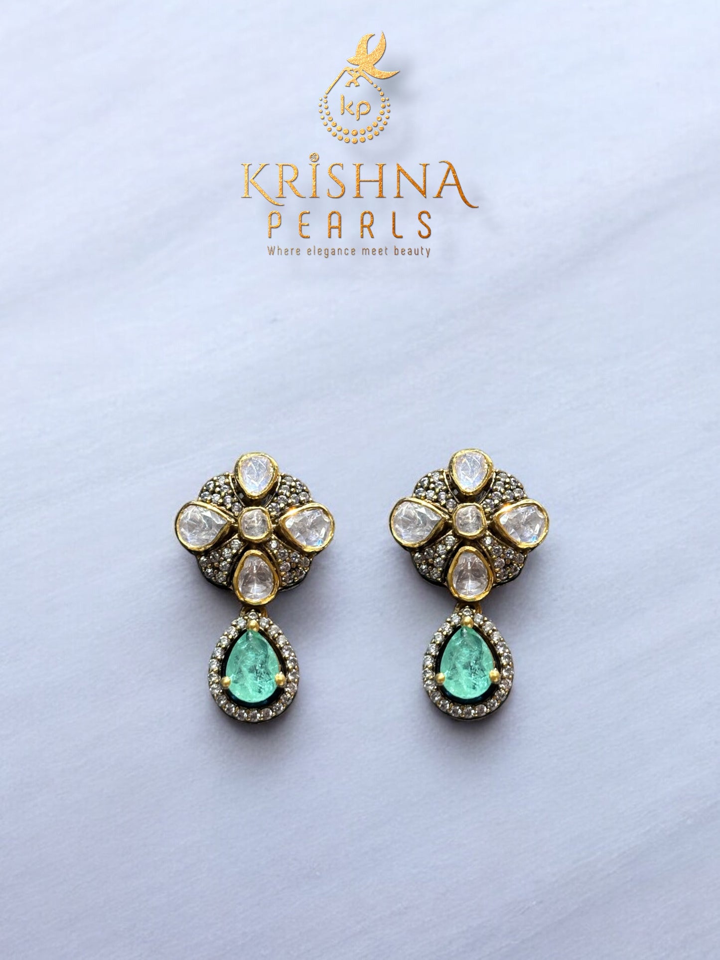 Embellishing 92.5 Silver Green Stone Zari Polki with Round Natural Pearl Necklace Set