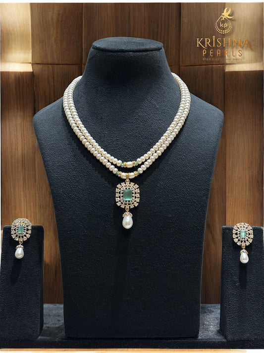 Adorable Blue Quartz Studded Pendent Pearls Necklace Set