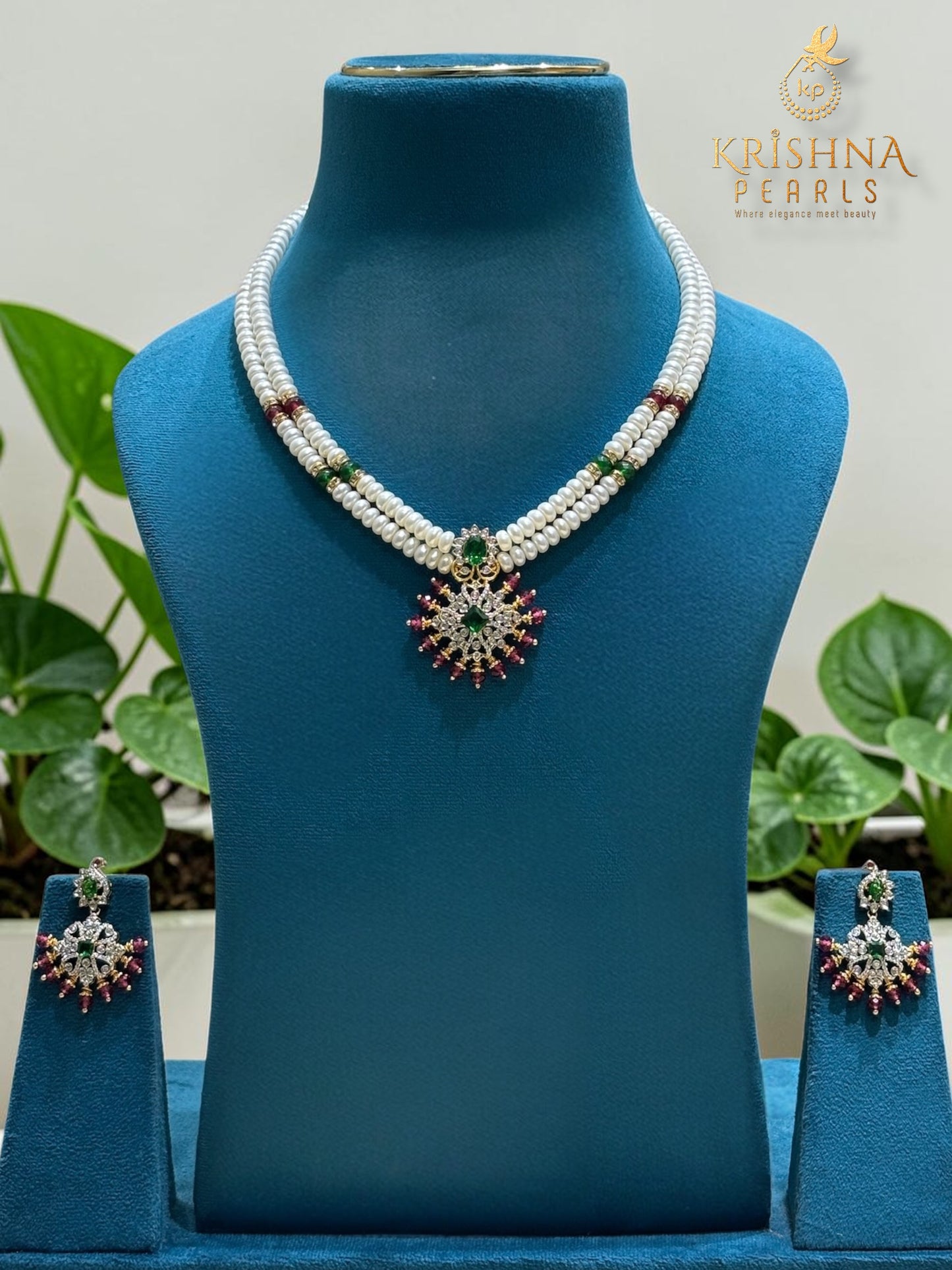 Natural Pearls Set with Ruby Emerald Studded Locket