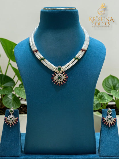 Natural Pearls Set with Ruby Emerald Studded Locket
