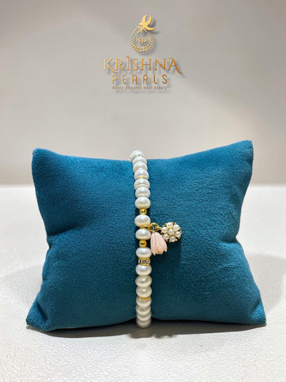 Beautiful floral Pearls Rakhi