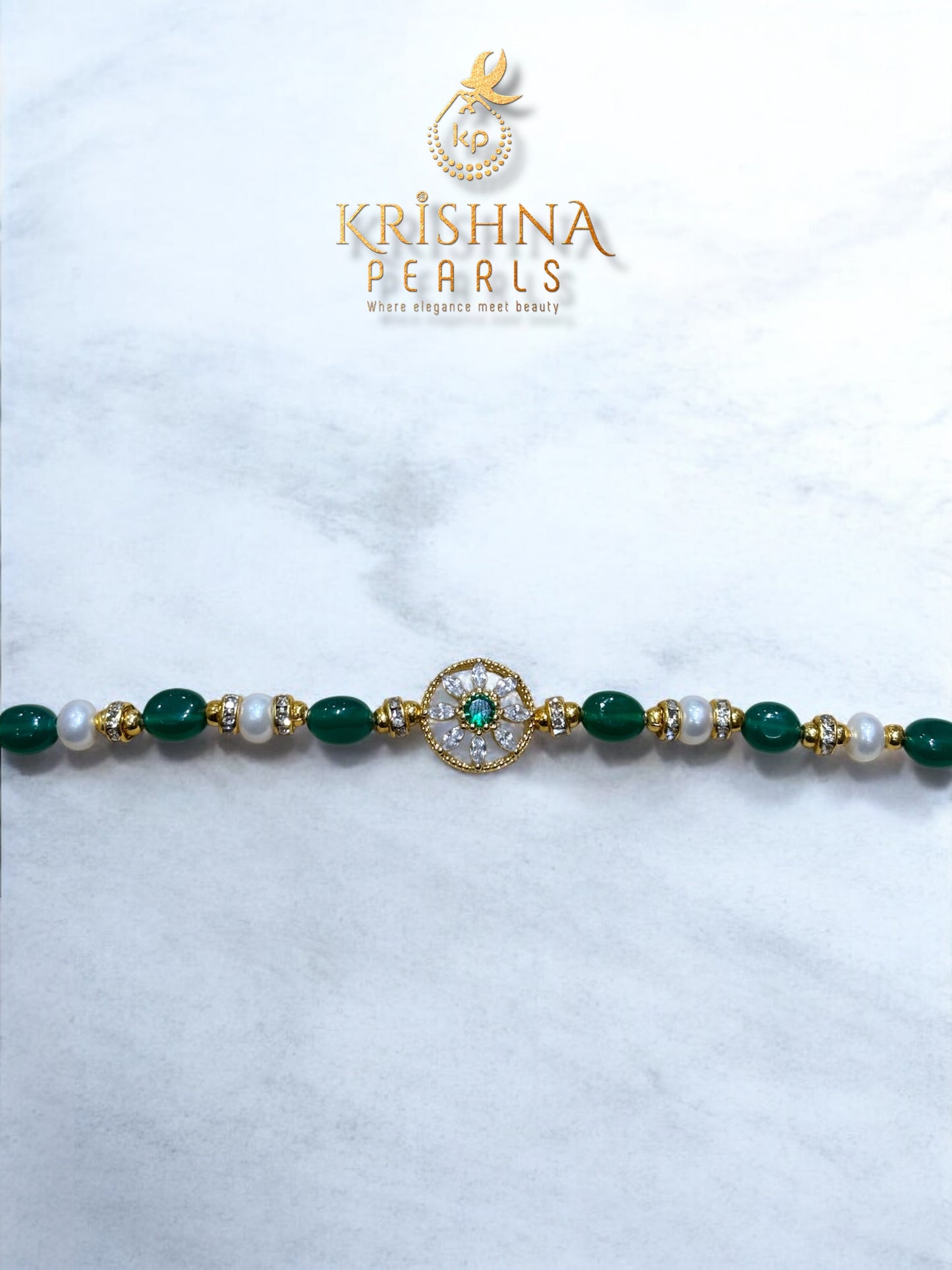Beautiful Pearls & Emeralds Rakhi