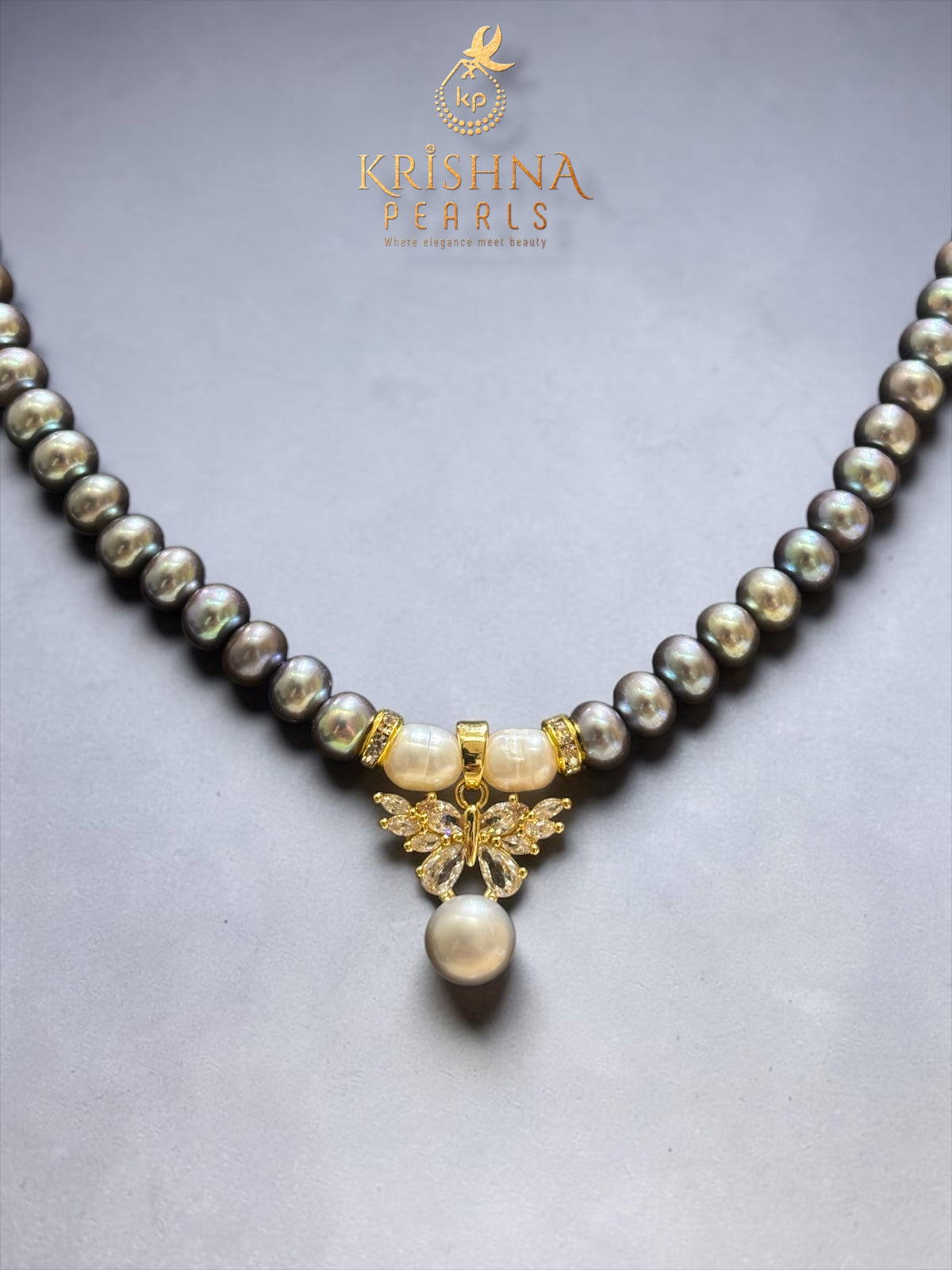 Beautiful Butterfly Grey Pearl Studded Pearls Combo Set ( Single Line Pendent Set With Finger Ring )