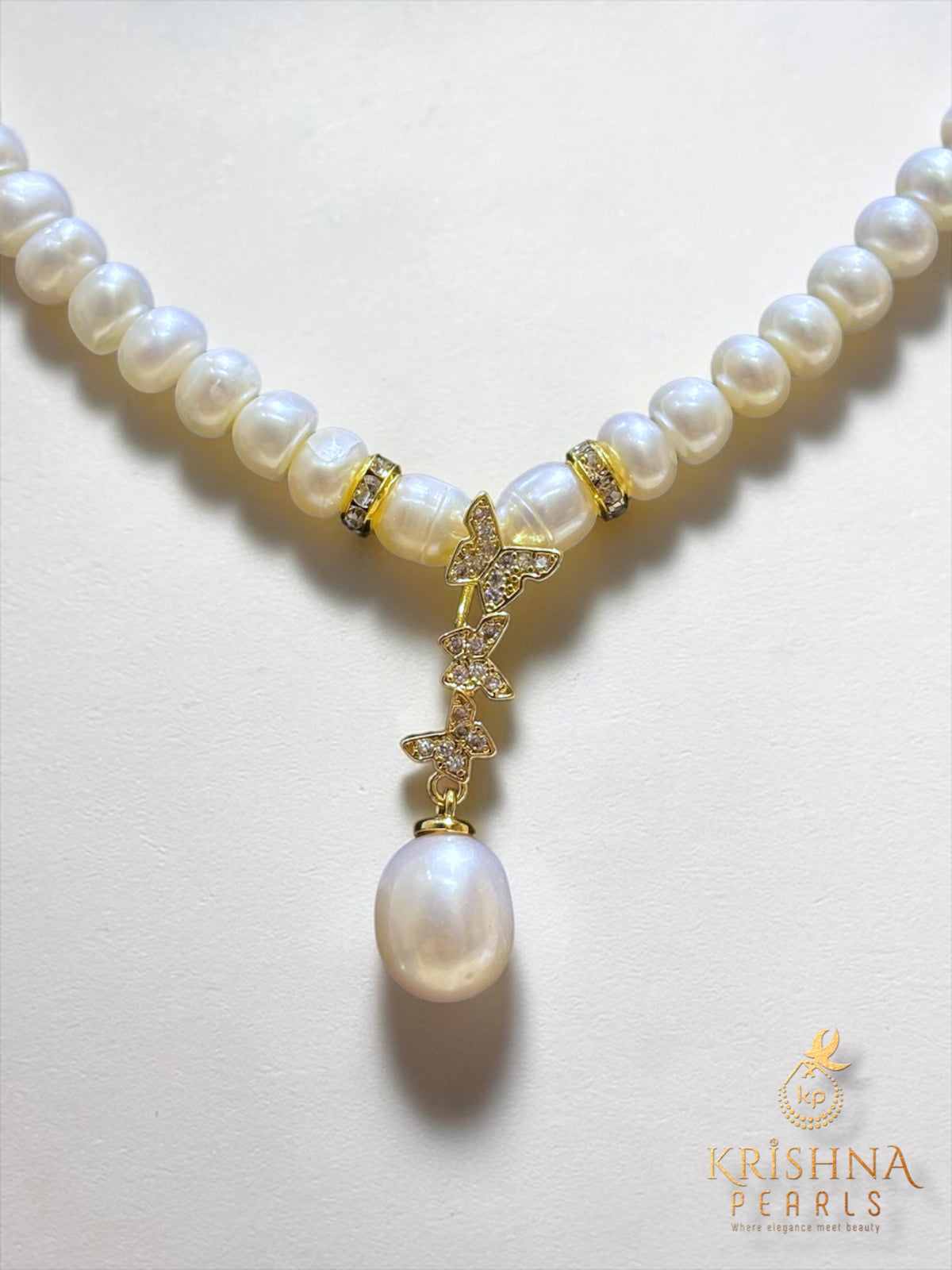 Designer Pearl With Butterfly Studded Pearls Combo Set ( Single Line Pendent Set With Finger Ring )