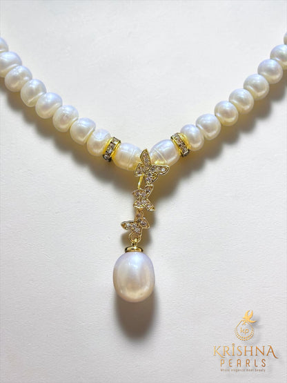 Designer Pearl With Butterfly Studded Pearls Combo Set ( Single Line Pendent Set With Finger Ring )