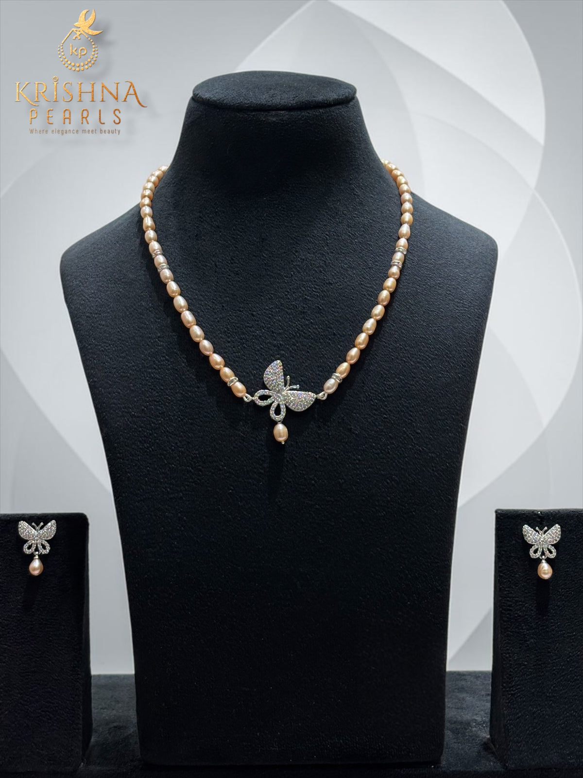 Beautiful Pink Pearls With Butterfly Pendent Necklace Set