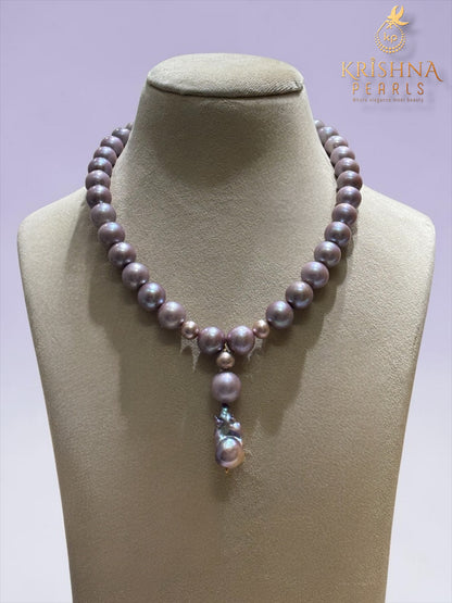 Lavender Shade 12 MM Pearls With Baroque Pearl In Center Necklace Set