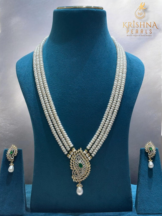 Exclusive Emerald Studded Pearls Necklace Set