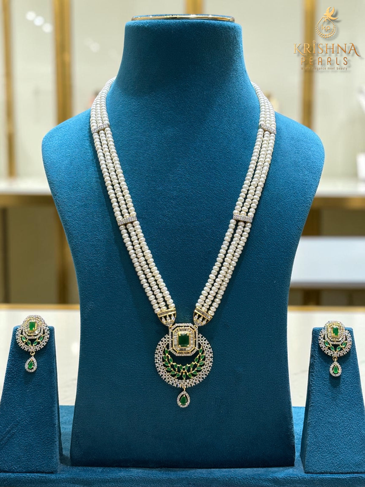 Beautiful Emerald Studded Three layer Pearls Long Rani Haar Set