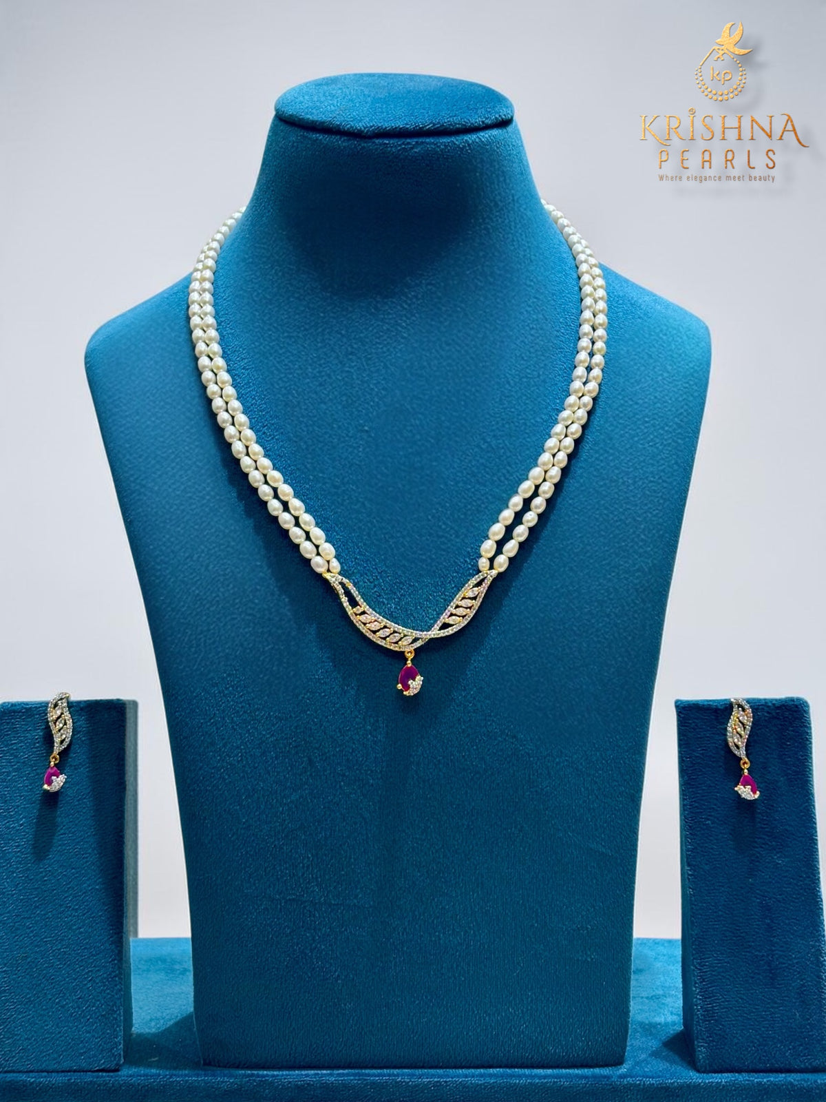 Classy DropCut Ruby Studded Pearls Necklace Set
