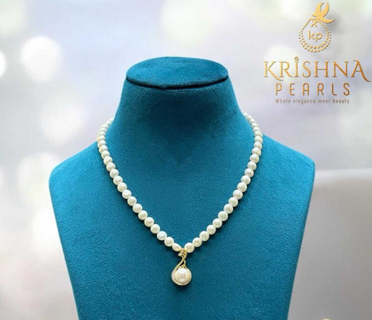 Adorable Big Pearl Studded Pendent With Button Pearls Necklace Set