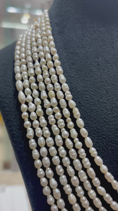 Irregular Lustrous 7 Layers Oval Pearls - The Imperfect Perfection