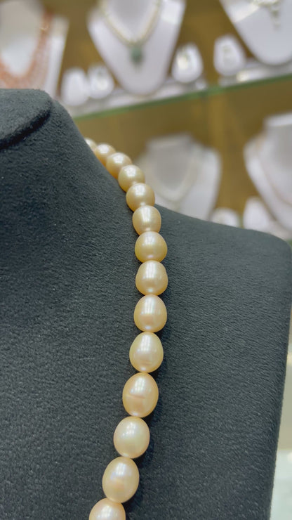 Lustrous Oval Shape Peach Pink Necklace
