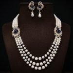 Exclusive Round Pearl Side Broch Set